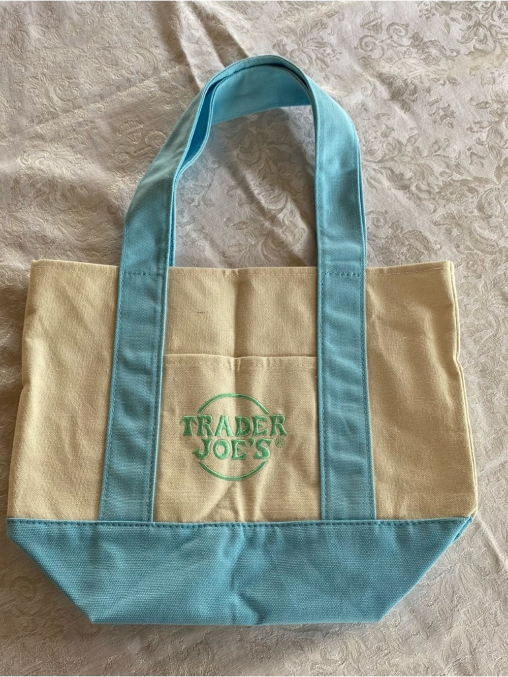 Trader Joe's Mini Foldable Canvas Tote Bag in pastel blue. New.